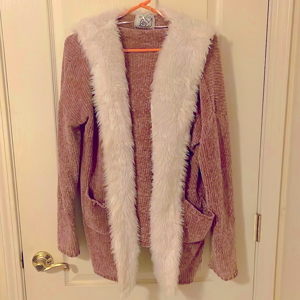 Light pink cardigan trimmed with white faux fur with hood. Soft, size medium.